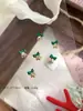 Joias para Nail Art Sino de Natal Exquisite Luxo Leve Borboleta Combinada com Diamantes de Unha Dourados Decorações Populares de Natal Atacado