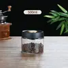 Frascos de vidrio sellados al vacío al por mayor, frascos de almacenamiento a prueba de humedad para granos de café y hojas de té, frascos de vidrio sellados a prueba de luz de gran capacidad