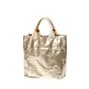 Bolsas de mano de papel DuPont negro brillante, todo tipo de bolsas con logo personalizado, comercio nacional e internacional OEM, procesamiento de marca privada