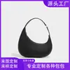 Nova bolsa de vela transfronteiriça para mulheres, bolsa de ombro versátil de alta qualidade, bolsa de mão de nicho elegante e simples, personalizada de fábrica