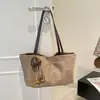 Bolso casual de gran capacidad para debajo del brazo para mujer, nuevo bolso de hombro vintage esmerilado 2026, bolso tote versátil de nicho para el día a día