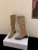 Primer encuentro con la versión coreana de las botas largas de hebilla de cinturón plisada bidireccional, en capas y cruzada para mujer, a la moda, retro, versátiles y adelgazantes