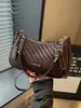 Bolso de media luna simple de moda de nicho con textura tejida vintage, nuevo modelo 2026 para el trabajo y los desplazamientos, bolso de hombro y cruzado para mujer
