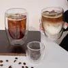 Copo térmico de vidro transparente em formato de ovo com dupla camada, ideal para leite, café, suco e outras bebidas. Feito em vidro borossilicato de alta qualidade.