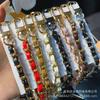 Cordão de Couro Pequeno Xiangfeng Moda Versátil Cor Sólida Cordão para Celular de Pulso Corrente para Celular Novo Senso Avançado Chaveiro