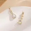 Pendientes de Gota de Agua con Forma de Pera de Venta Caliente Transfronterizos, Versátiles, Simples, Elegantes, Modernos, Banquete de Boda, Estilo de Lujo Ligero, Pendientes de Pétalo