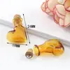 Colgante para teléfono móvil con forma de botella de champán al por mayor, colgante para teléfono móvil de botella de perfume, botella flotante, mini botella de los deseos