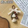 Sino de Vento de Casca de Fruta de Yunnan Pingente de Bolsa Casca de Fruta Tecida à Mão Semente Produto Acabado Pingente de Nicho Ornamento de Carro Construção de Equipe para Salão
