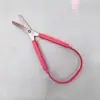 Suministro transfronterizo automático anillo elástico tijeras punto conjunto multicolor grande pequeño herramienta anillo tijeras