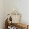 Bolso de Mujer 2026 Primavera Nuevo Bolso de Cuero PU de Gran Capacidad Bolso de Hombro y Mano para Mujer Bolso Tote de Gama Alta de Nicho para Viajes