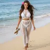 Cobertura de praia europeia vestido sexy vazado proteção solar saia de praia sexy produtos de fábrica em estoque