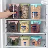 Tarro sellado de plástico transparente de grado alimenticio para almacenamiento de granos de cocina, aperitivos y té seco.