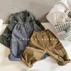 Outono 2026 Huzhou Zhili Roupa Infantil Estilo Coreano Primavera Algodão Lavado Calça de Trabalho Calças Meninas Meninos 7560