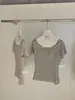 Wgwe9375 Guangzhou Shisanxing Roupa Feminina Verão Nova Gola Redonda Listrada Design Color Block Manga Curta Camiseta Top Fino
