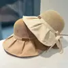 Sombrero de pescador de ala ancha para mujer, estilo coreano, combinable con todo, para viaje, protector solar, fino, con lazo