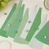 Estrelas de papel de origami verde sólido coloridas, estrelas da sorte, estrelas de origami, pentagramas dobrados, origami feito à mão