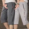Pantalones cortos de seda helada para hombre de siete puntos con abertura, holgados, estampados, shorts exteriores, pierna recta, talla grande, pantalones cortos para personas con sobrepeso, intermedios