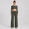 Conjunto de ropa de yoga transfronterizo con diseño de espalda hueca, camiseta deportiva de manga larga, pantalones rectos holgados de cintura alta, conjunto de fitness