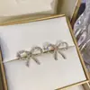 Brincos de tarraxa com zircônia microincrustada, laço doce e pérola, design único de nicho, alta qualidade