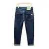 Jeans de Sarja Masculino para Atacado Primavera e Outono Marca da Moda Calças Casuais Retas Largas Moda Calças Masculinas Lavadas em Água Elásticas Versáteis Calças Compridas