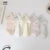 Calcetines para niñas Yishuangshuang, nuevos calcetines de otoño e invierno con forma de corazón de dibujos animados hasta la mitad de la pantorrilla, algodón peinado, calcetines estilo Miu con letras y caras sonrientes para estudiantes