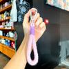 Acessórios de pingente de cordão para celular de pelúcia Cor macaron pequena bolsa transparente pingente de chave corrente de celular prática pingente
