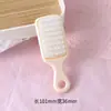 Peine mini lindo estilo Ins de colores dulces con espejo de maquillaje portátil, alto valor estético para el peinado de las niñas