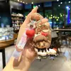 Lindo llavero de Sanrio con colgante de muñeco de dibujos animados para coche, accesorios para bolso, adornos colgantes, pequeño regalo al por mayor
