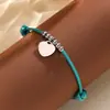 Pulseira Colorida de Corda de Couro Tecida à Mão Mais Vendida Transfronteiriça com Pingente de Coração Brilhante de Aço Inoxidável Pulseira Ajustável Atacado