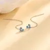 Pendientes de Hilo de Oreja de Zirconia de Flor de Iris Azul Venta al Por Mayor Transfronteriza de Amazon Pendientes de Borla de Trébol Estilo Largo Moda