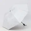 Venta al por mayor de fábrica Paraguas Plegable de Tres Secciones con Poste Engrosado Protección UV Protección Solar Estampado en Caliente Paraguas de Plumas Paraguas con Pegamento Negro para Sol y Lluvia Paraguas de Sol