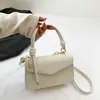Bolso bandolera de un solo hombro con textura de color sólido, elegante, bolsa cuadrada pequeña para ir al trabajo en verano 2023, popular este año, bolso pequeño para mujer