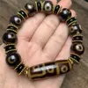 Venta al por mayor de fábrica Pulsera con patrón de respaldo de ágata amarilla de diente de Xizang, pulsera de cuenta de bambú de ágata verde, alta en aceite, de tres ojos, de nueve ojos