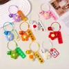 Llavero de flor de pompón de ganchillo, colgante para bolso, accesorio exquisito y práctico para estudiantes, regalo de graduación para profesores