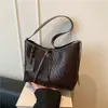 Bolso de mujer con patrón tejido vintage transfronterizo, nuevo popular de principios de otoño 2026, versátil, de gran capacidad, para hombro y cruzado, tipo tote
