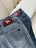 Jeans de Pierna Ancha con Bordado de Lazo Navideño Nuevo Invierno 2025 Pantalones Rectos Adelgazantes Forrados de Polar para Mujer