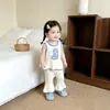 Conjunto Energético de Angelito para Niña: Top de Tirantes Transpirable Amigable con la Piel para Verano Combinado con Pantalones de Campana con Volantes