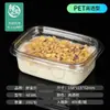 Caja rectangular de plástico transparente con tapa, compartimentada y sellada, para empaquetar ensalada de frutas.