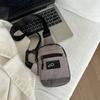 Bolso de Pecho de Nicho 2026 Nuevo Modelo de Verano Mini Casual Moda Versátil para Pareja de Hombro Único Cruzado Deportivo Color Sólido Bolso para Teléfono
