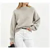 Tienda independiente 2026 primavera y otoño para mujer tejido de punto suelto europeo y americano cuello redondo manga larga versátil moda suéter de color liso venta al por mayor