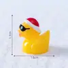 Nuevo producto transfronterizo: Gafas de sol creativas y adorables en miniatura con temática navideña para figuras de patos, utilizadas como accesorios decorativos y pequeños adornos para crear paisajes en miniatura