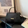 Bolsos de moda tendencia 2026 nuevo modelo patrón de cocodrilo elegante simple para el día a día hombro bandolera venta al por mayor