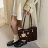 Nova Bolsa Feminina Versátil e Única Outono/Inverno 2026, Bolsa de Ombro Estilosa, Bolsa Saco Cor Sólida Casual com Padrão Trançado