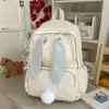 Mochila escolar de costas duplas em desenho animado, mochila popular para estudantes do sexo feminino, novo modelo leve 2026, grande capacidade, coelho fofo com orelhas