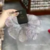 Selección PremiumElásticos elegantes y con estilo, nueva colección de accesorios para el cabello de nicho de alta gama para recoger el cabello en la parte posterior de la cabeza
