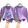 Camiseta de manga larga para niño 2026 nuevo modelo, camiseta básica de dibujos animados para niño, camiseta interior de algodón puro a rayas para otoño, estilo primavera y otoño