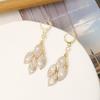 Pendientes de Plata de Ley S925 de Puesto de Mercado Nocturno Pendientes de Alta Gama Pendientes Simples de Nicho con Perlas Lujo Accesible Pendientes de Borla Pendientes para Mujer