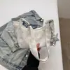 Bolso de mujer transfronterizo 2026 nuevo verano versión coreana bandolera única de hombro bandolera cruzada de moda casual ligero de alta gama moda bolso de albóndiga