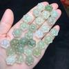 Suministro de transmisión en vivo, flor de ciruelo de jade hetiano natural, pequeños accesorios, material Qinghai, color agua soleada, jade hetiano, bricolaje, agujero, pequeña flor