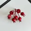 Atacado de fabricante transfronteiriço de frutas vermelhas artificiais, frutos de azevinho da sorte, decorações festivas de Natal e Ano Novo para casa